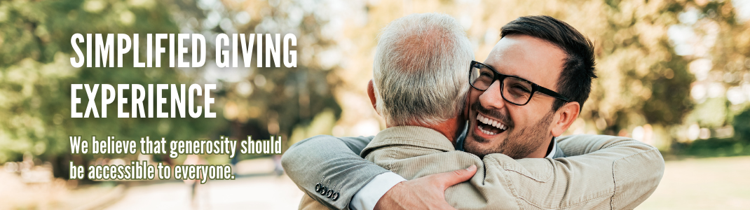 Simplified Giving Experience: Two men hugging and smiling.